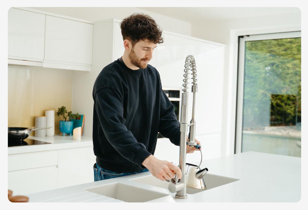 man_using_water_included_in_bills_package man_using_water_included_in_bills_package